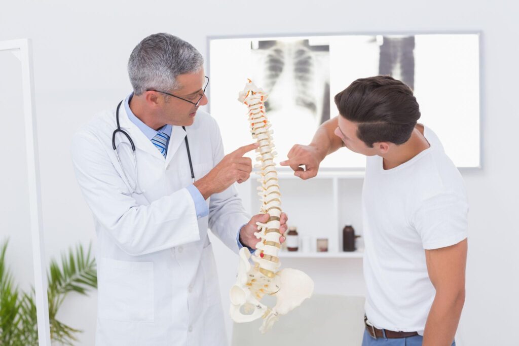 orthopedic doctor in Gurgaon treating back pain